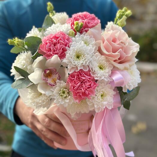 Flowers in a box. French rose, lisianthus, dianthus, chrysanthemum , orchid , eucalyptus