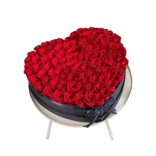 RED ROSES IN A BLACK BIG BOX