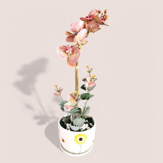 Lifelike Orchid in Decorative Container