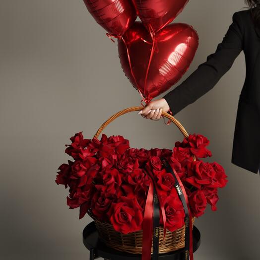 Flowers in basket with roses red