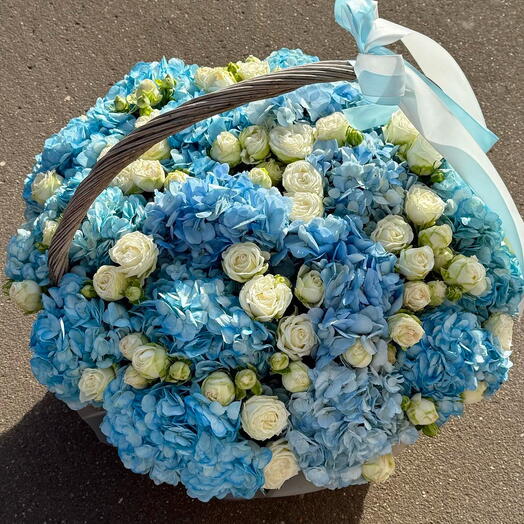 Flowers in basket blue