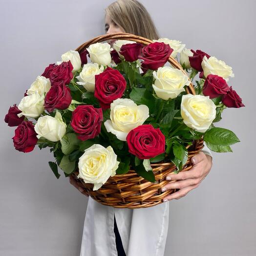 Basket with red and white roses