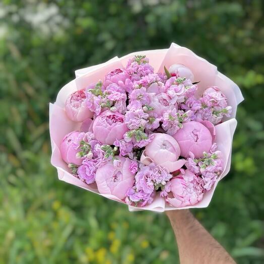 Bouquet of peonies with fragrant matiola