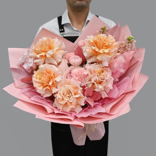 Pink dawn bouquet of French roses and matiolla