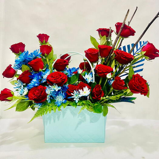 Stylish spring:30 Stems Of Red Roses   3 Stems Of Blue spray Chrysanthemum In A Blue Bag