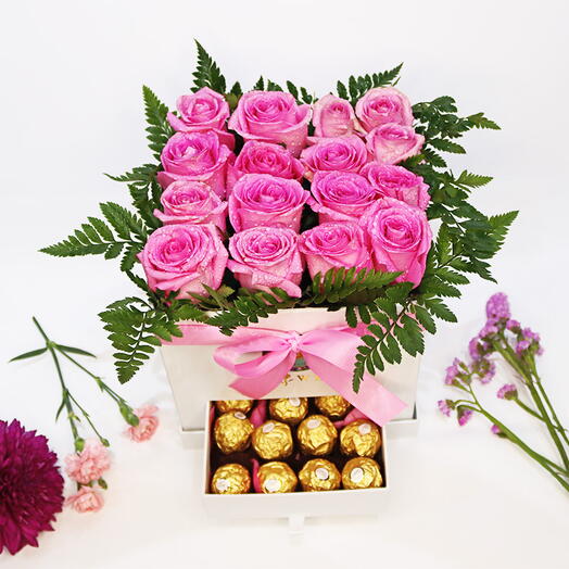 Pink roses in chcolate Box