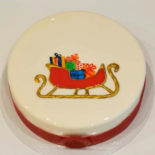 Sleigh with Christmas presents mousse cake