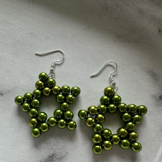 Metalic green star earrings