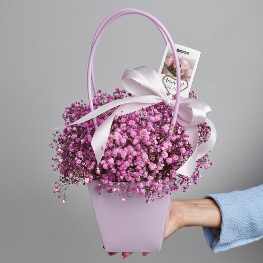 Pink gypsophila in the handbag