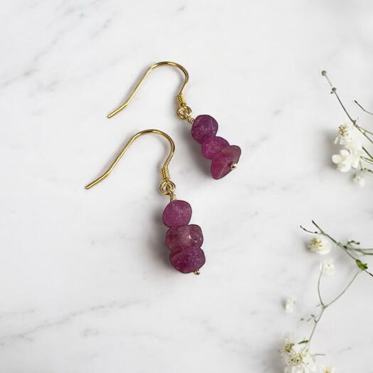 Raw pink sapphire gold earrings