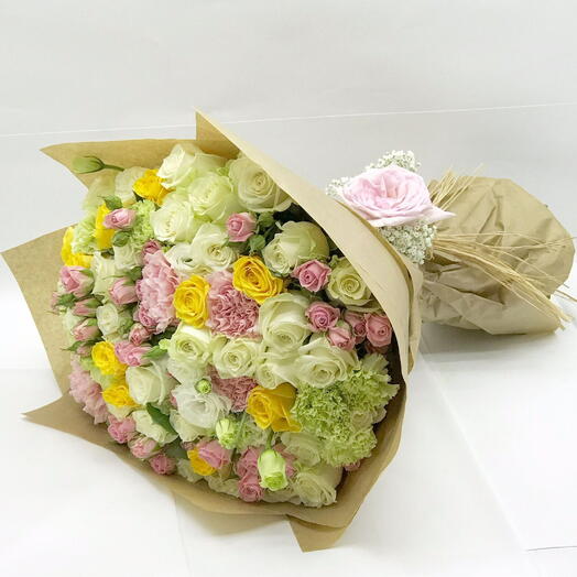 Enchanted Garden Bouquet: White Roses, Pink Carnations, Green Carnations, and Pink Spray Roses in Brown Wrapping