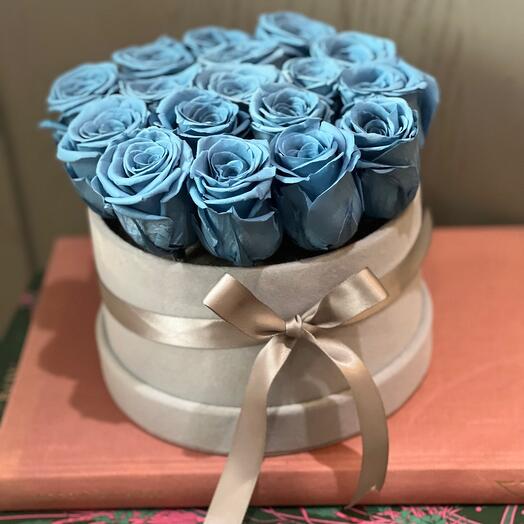 Light blue roses in a box