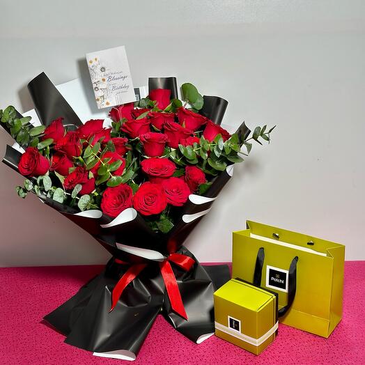 Red Rose Flowers And Patchi Chocolate