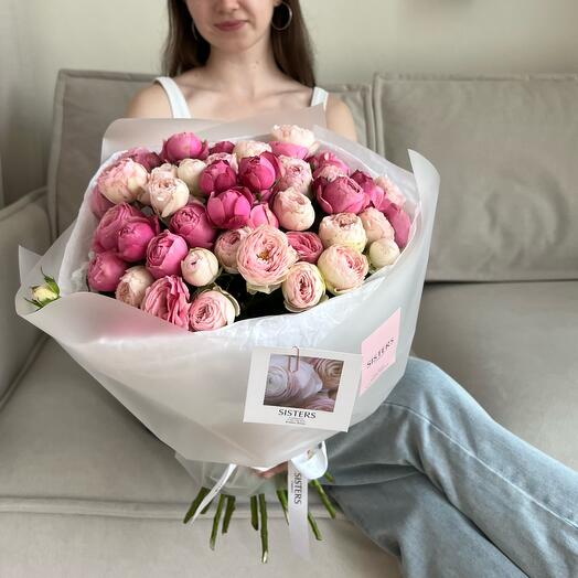 A large bouquet of 19 peony-shaped bush roses