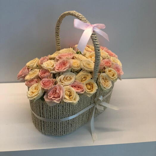 Elegant pink and peach flower basket