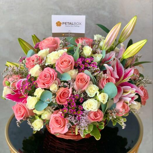 Pink Hermosa Roses, Pink Lilies , White baby roses in basket Arrangement