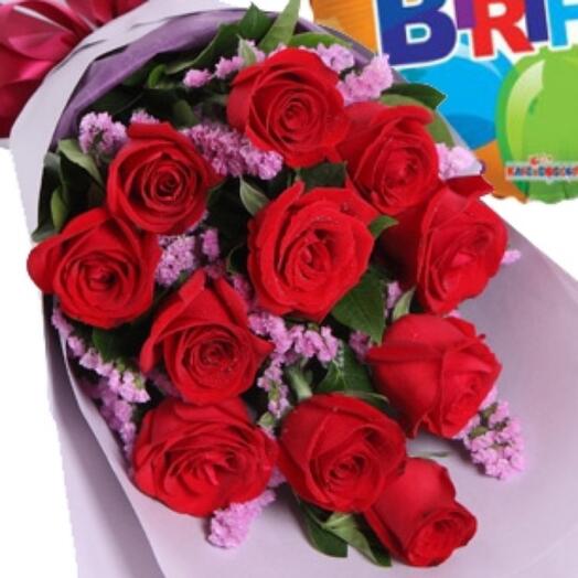 Red roses bouquet with birthdays balloon