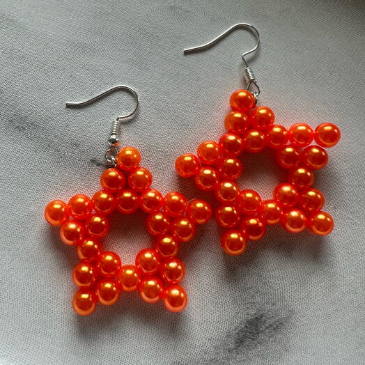 Shiny orange pearl earrings
