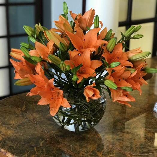 Orange lily arrangement