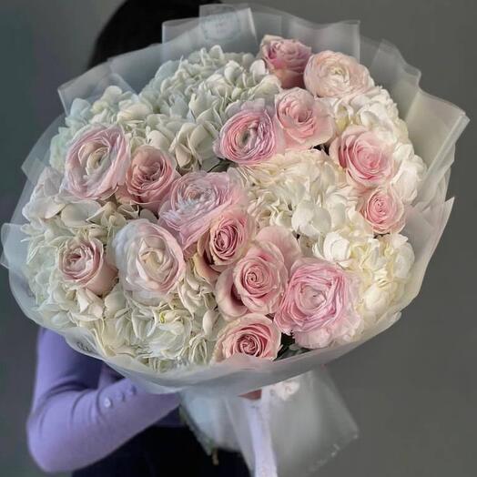 Bouquet of white hydrangeas,pink ranuculus,peony-shaped rose