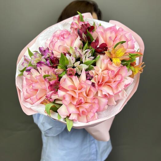 Bouquet of delicate French roses and bright alstroemerias