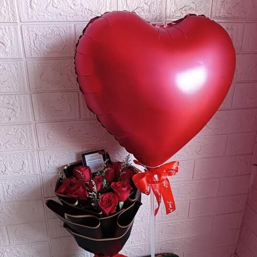 Red roses bouquet with balloons