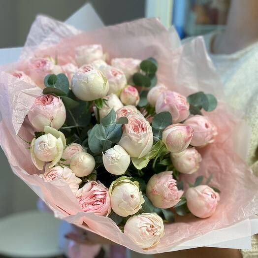 Monobucket of pale pink peony-shaped roses