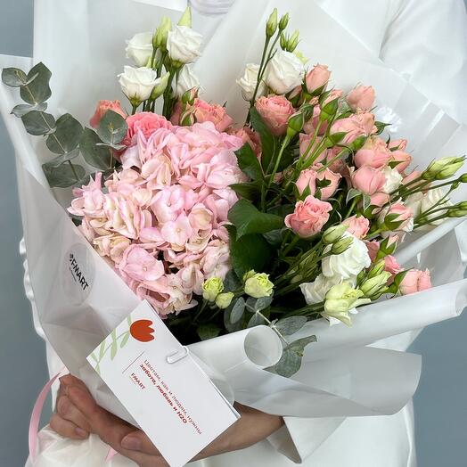 Bouquet of hydrangeas with a bush rose