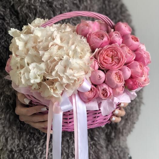 Delicate basket with hydrangea and peony rose