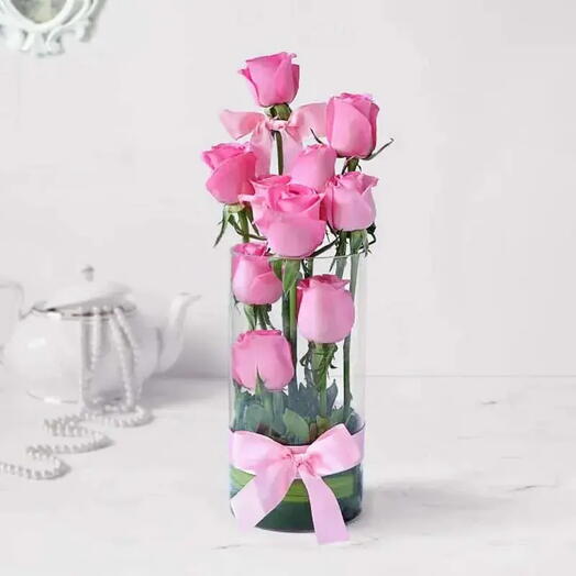 Pink Roses Cascade: Steps of Beauty in Vase – 10 Pink Roses, Green Leaves, Glass Vase, Ribbon Bow