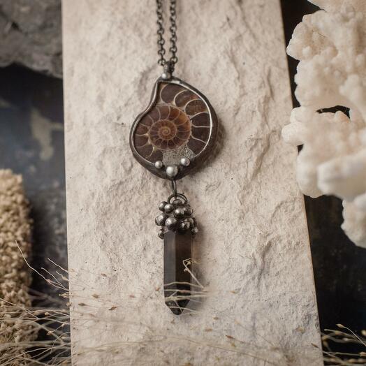 Pendant with ammonite and smoky quartz crystal