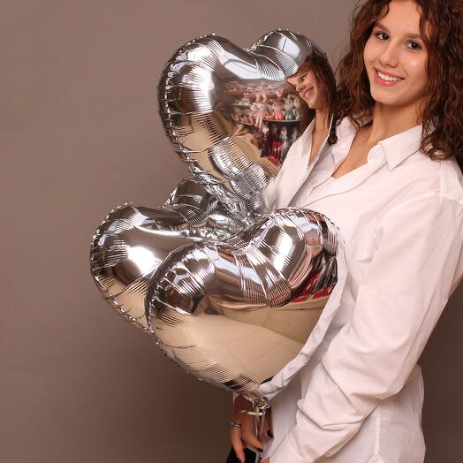 Set of three helium foil silver hearts