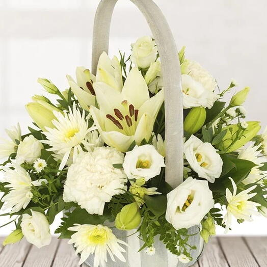 White Beauty: 4 White Lilies, 3 White Estoma, 3 White Spider Chrysanthemums Seasonal Greens