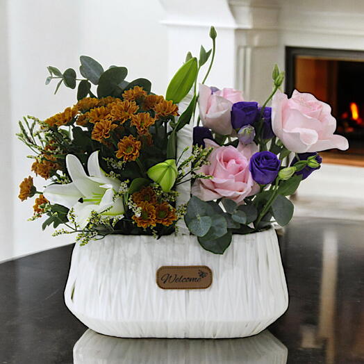 Elegant White Floral Arrangement in a Basket