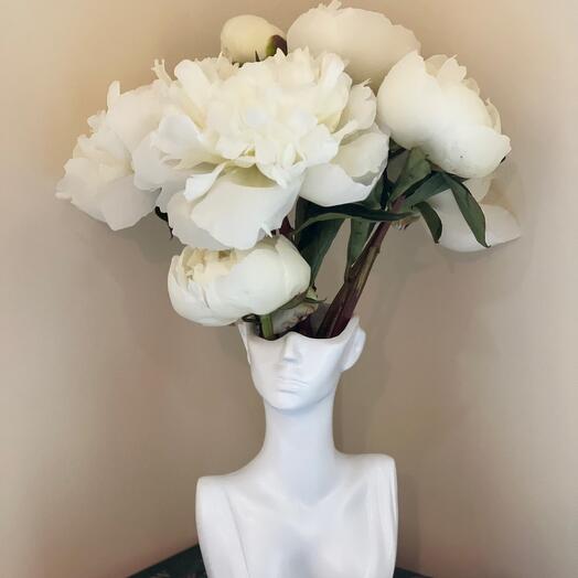 White peony s in a sculpture vase