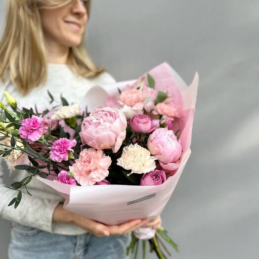 Bright bouquet with peonies and ranunculus