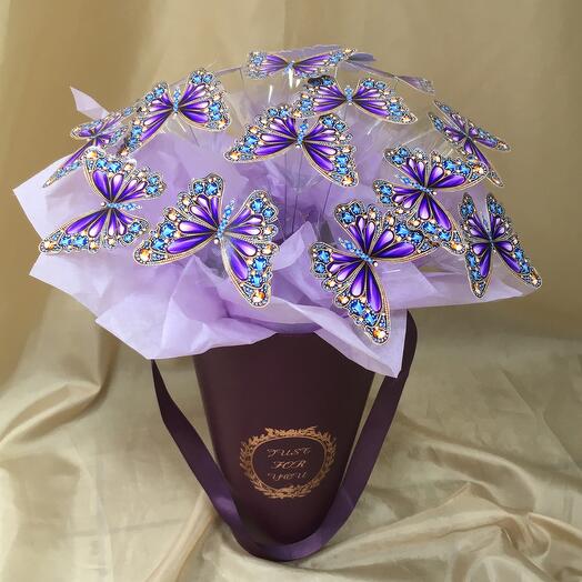Butterflies in a decorative planter, the color of the backlight is purple