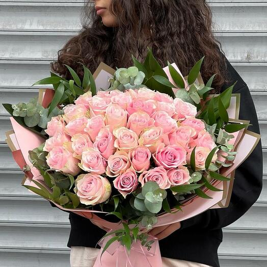 Bouquet of pink roses and greenery