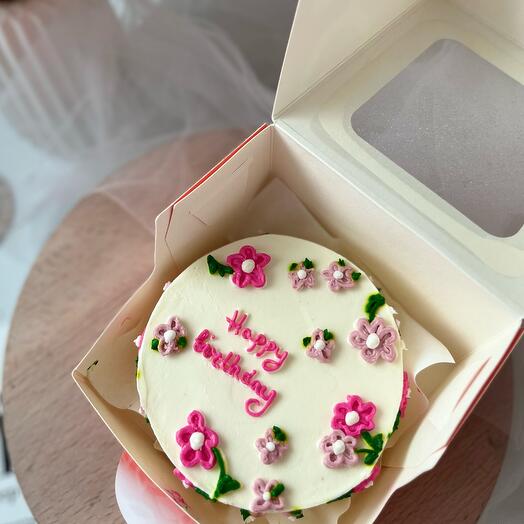 Pastel de Bento con flores de crema para niña