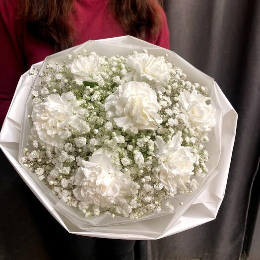 Bouquet of snow-white gypsophila with bush carnation